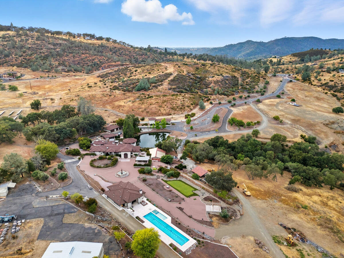 An overall view of the gated estate at 2155 Salmon Valley Lane in El Dorado Hills shows the 48-acre property, which includes a 9,800-square-foot main residence, pond, runway, hangar and pool house. The estate is listed for $6 million.